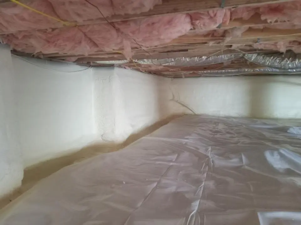 Crawl space encapsulation with closed-cell spray foam for Commercial Roof Restoration in Trotwood